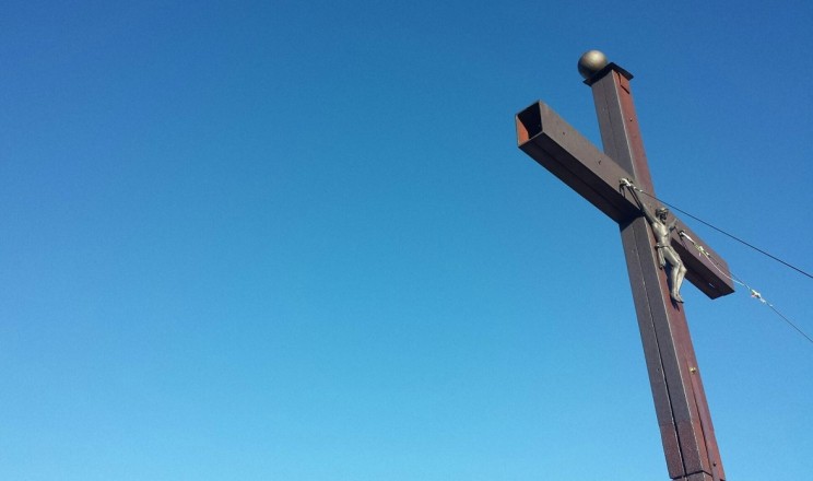 Worth the hike: Reaching the summit cross!